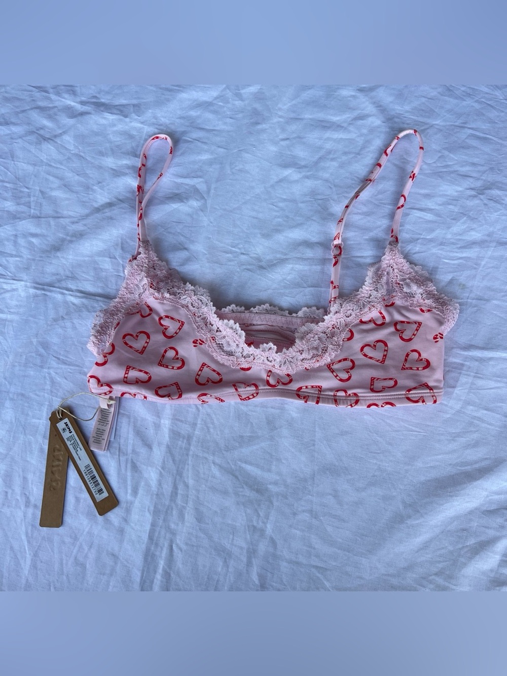 Skims fits everybody lace scoop bralette in candy heart print size small $38